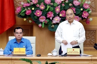 阮春福总理出席政府与劳动总联合会协调工作会议